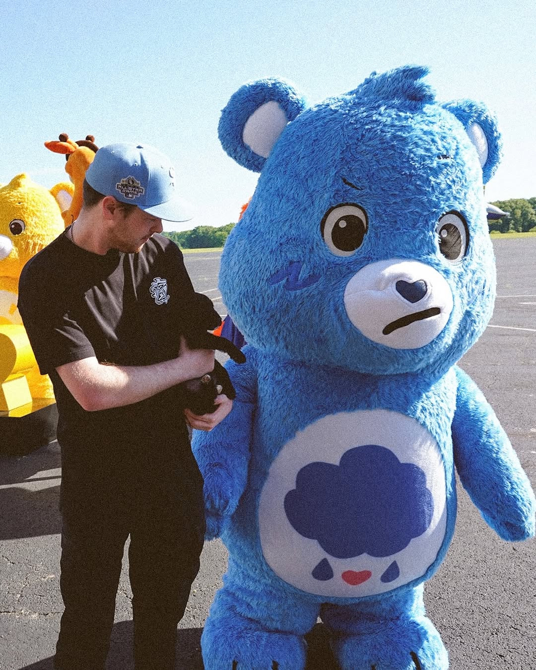 Will Weinbach with Grumpy Bear from Care Bears in New York